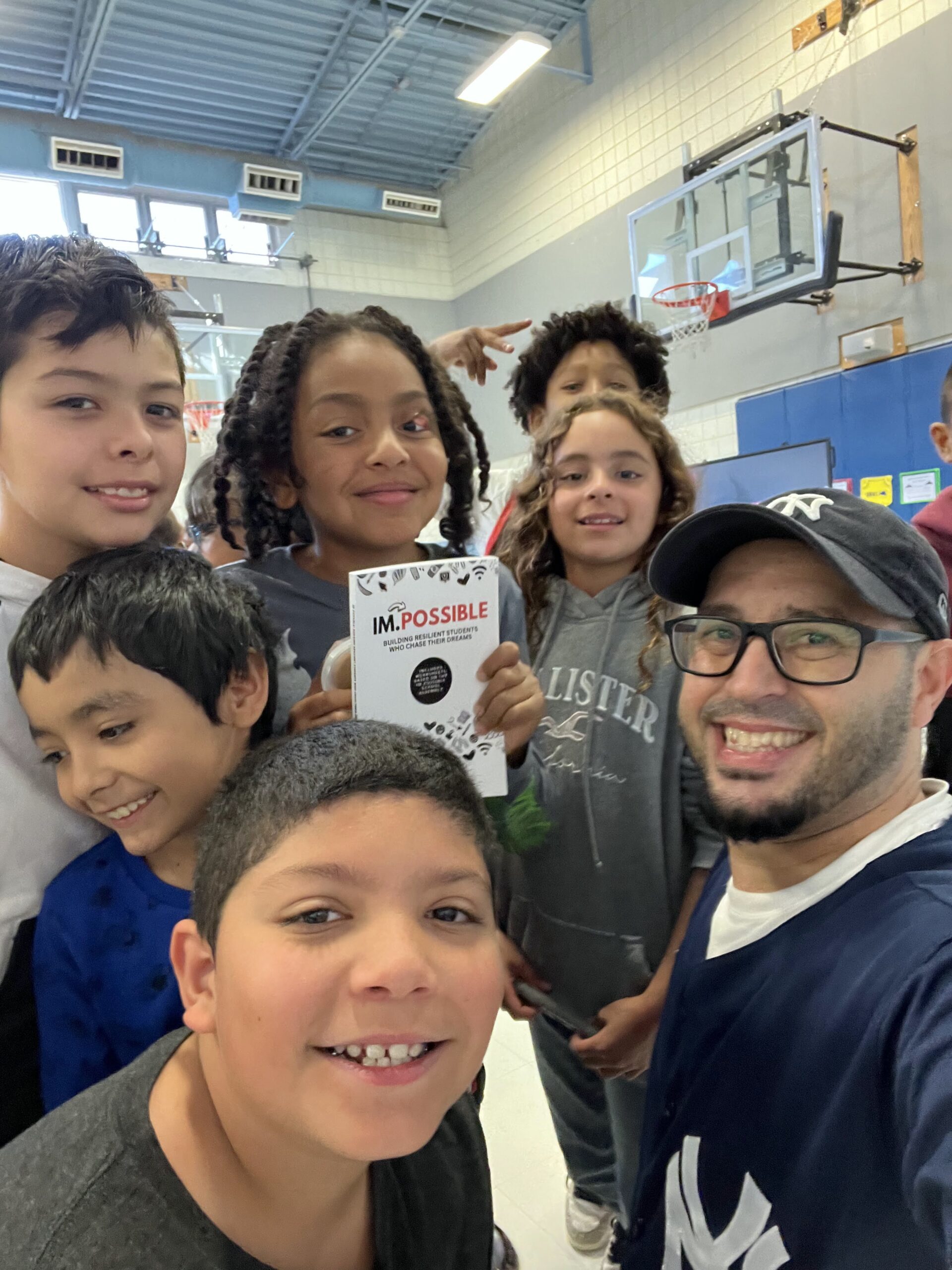 Motivational youth speaker Eddie Cortes with students at the Alamosa School Assembly in NM