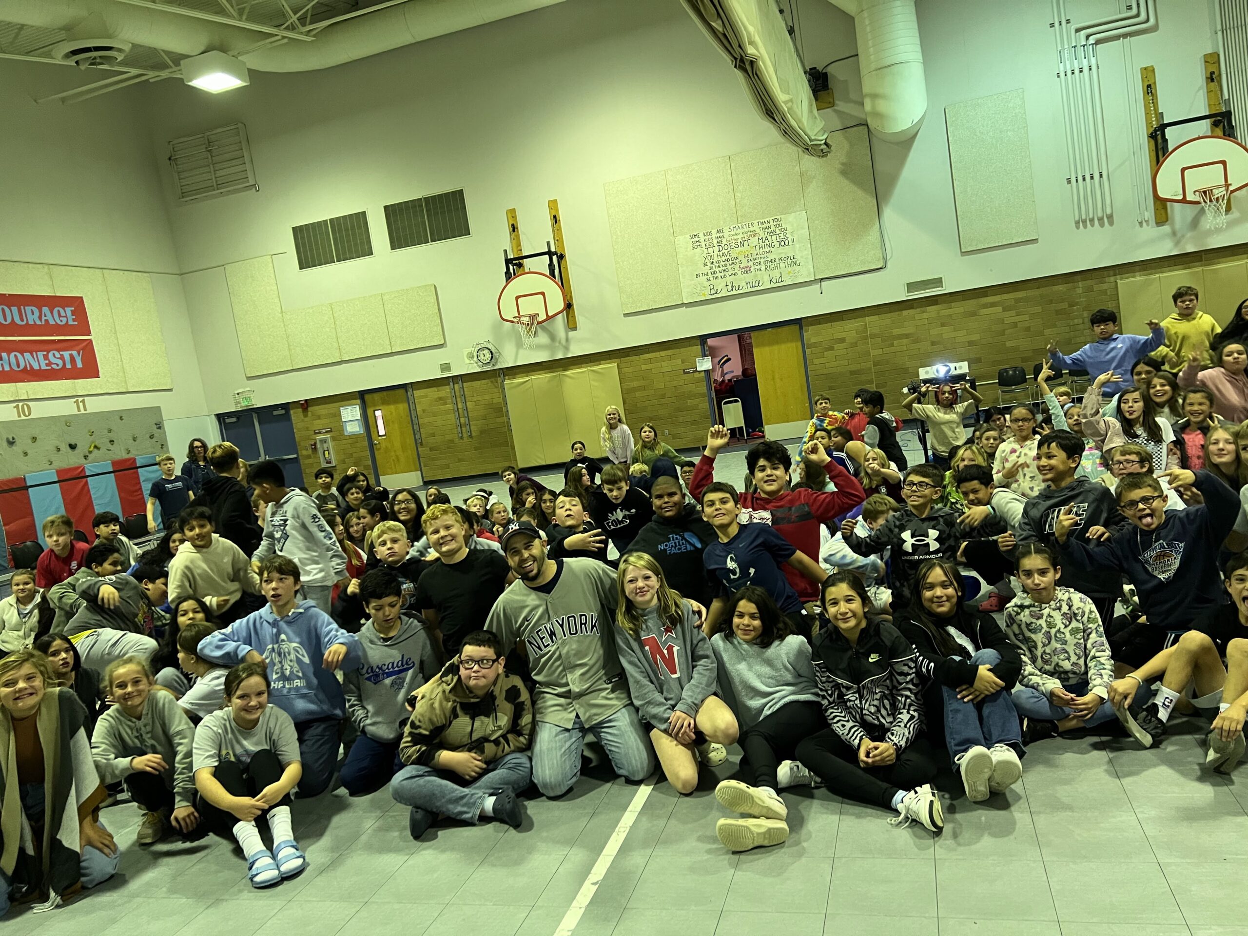 Motivational Youth Speaker Eddie Cortes with students at the school assembly program at Cascade Elementary School Motivational Youth Speaker Eddie Cortes with students at the school assembly program at Cascade Elementary School