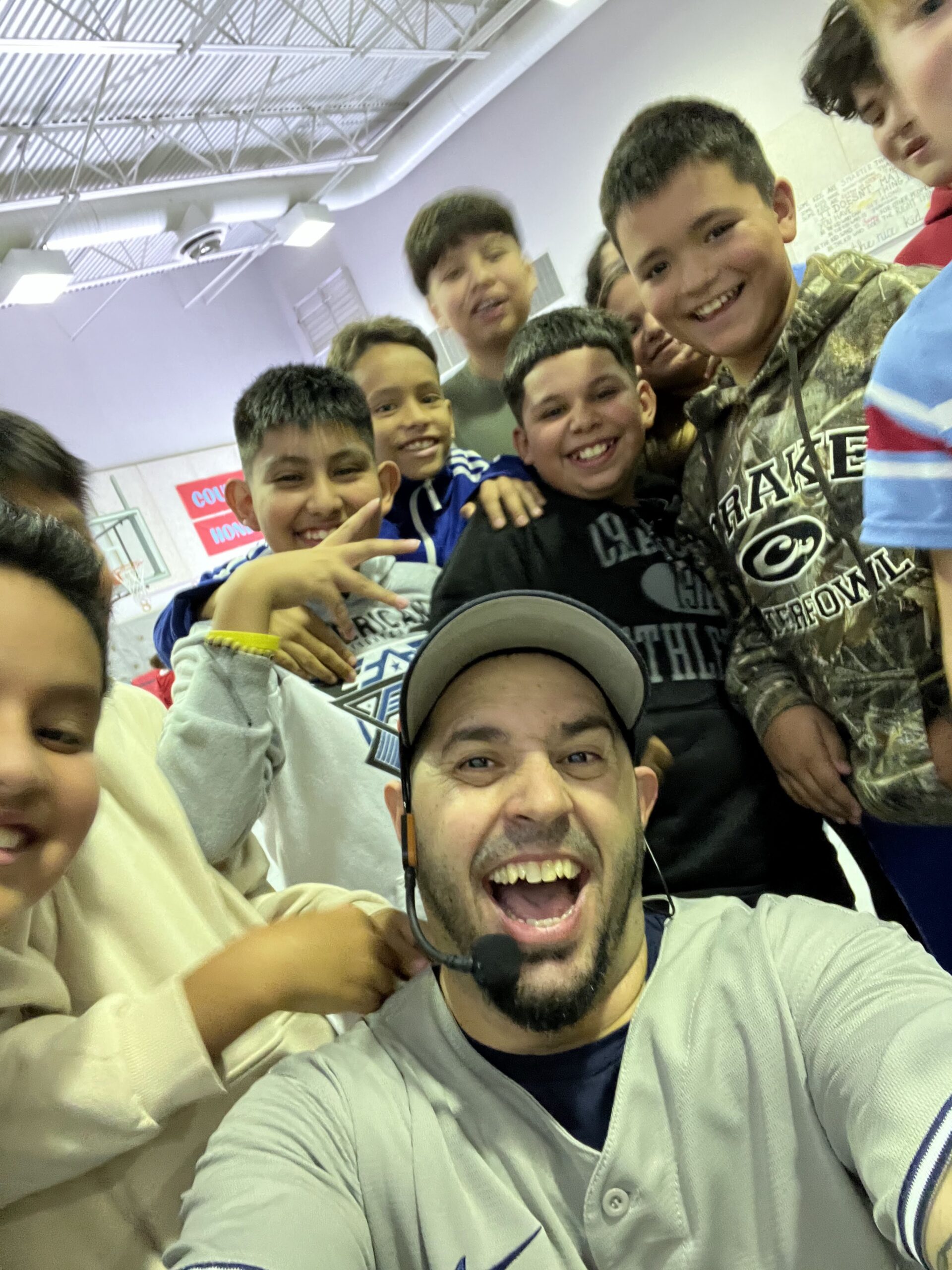 Eddie Cortes with elementary students at Cascade Elementary School Assembly