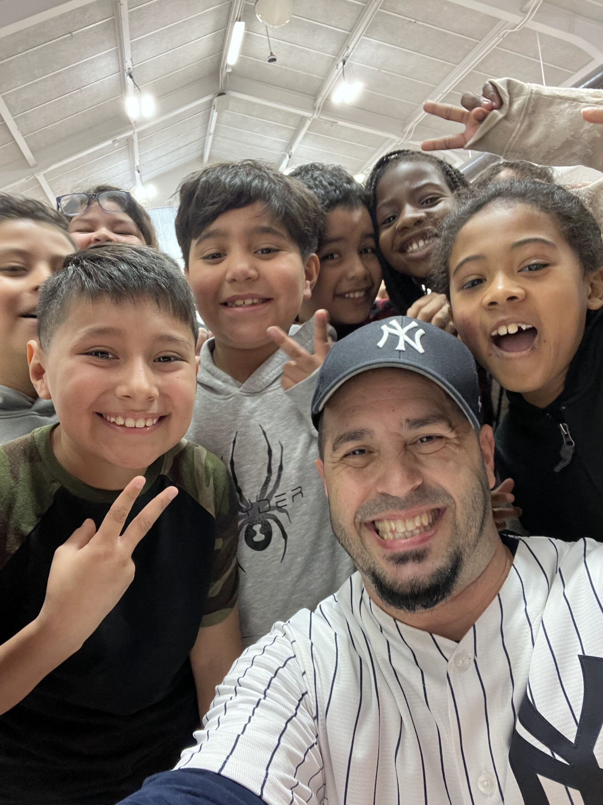 Eddie Cortes at West Gate Elementary School in VA with Students